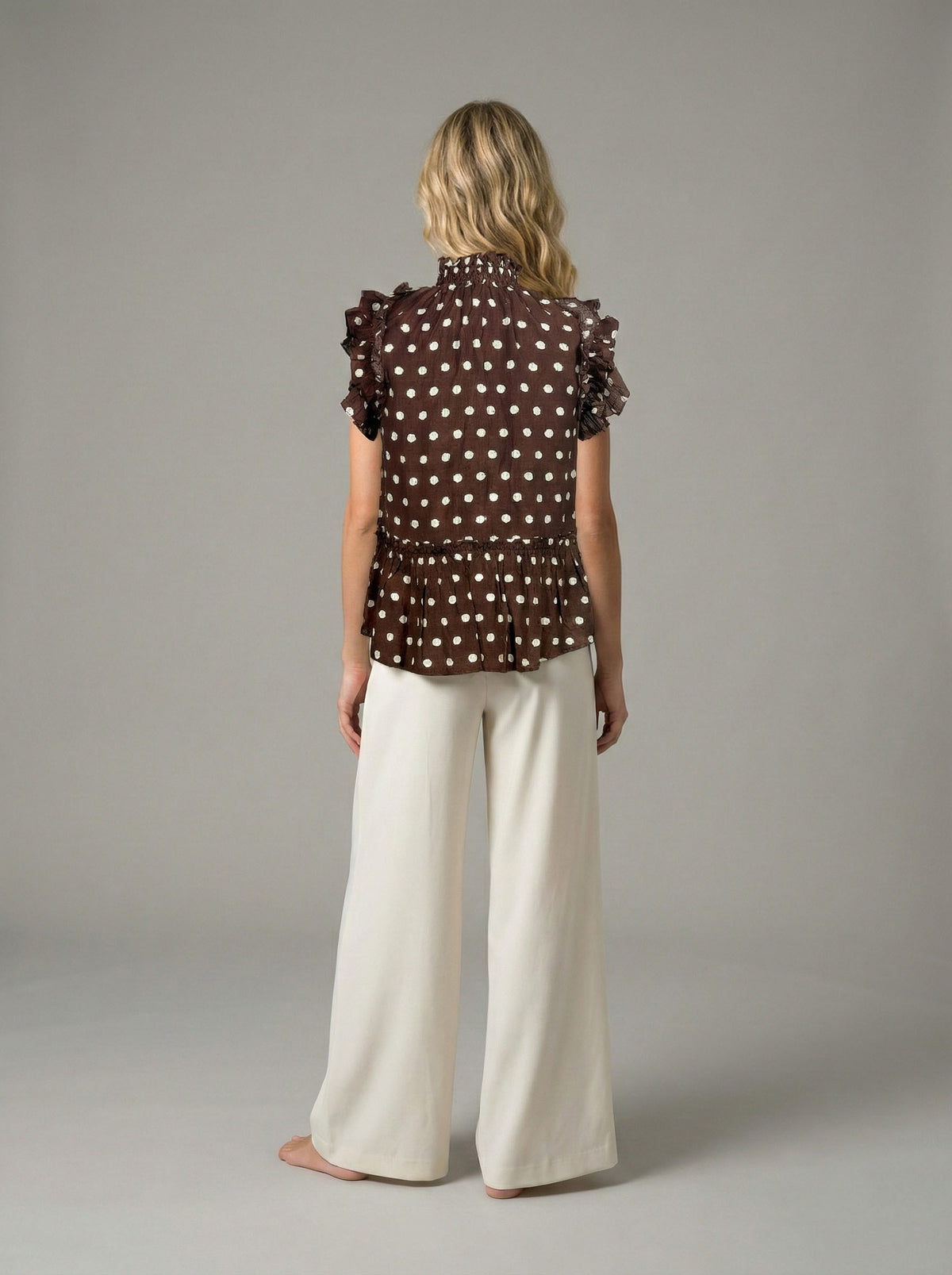 Chestnut Polka Dot Smocked Peplum Blouse