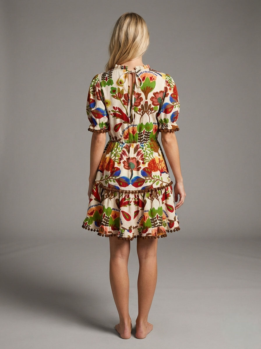 Wild Garden Tassel Trim Tiered Mini Dress