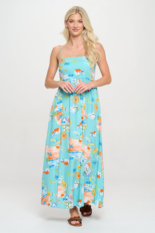 Model wearing a bright coastal-printed tiered maxi dress with square neckline and spaghetti straps
