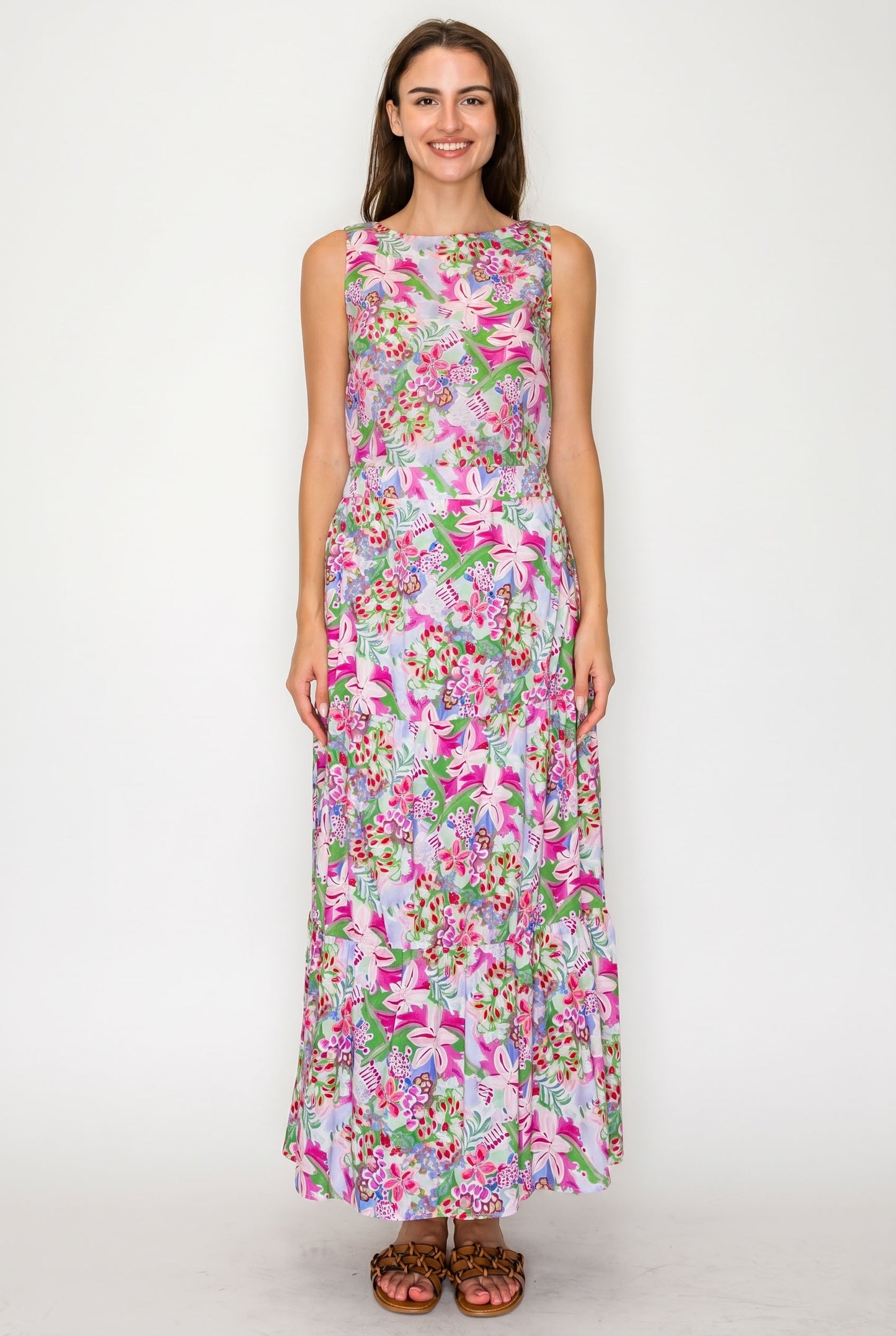 Woman wearing a floral dress on a white background