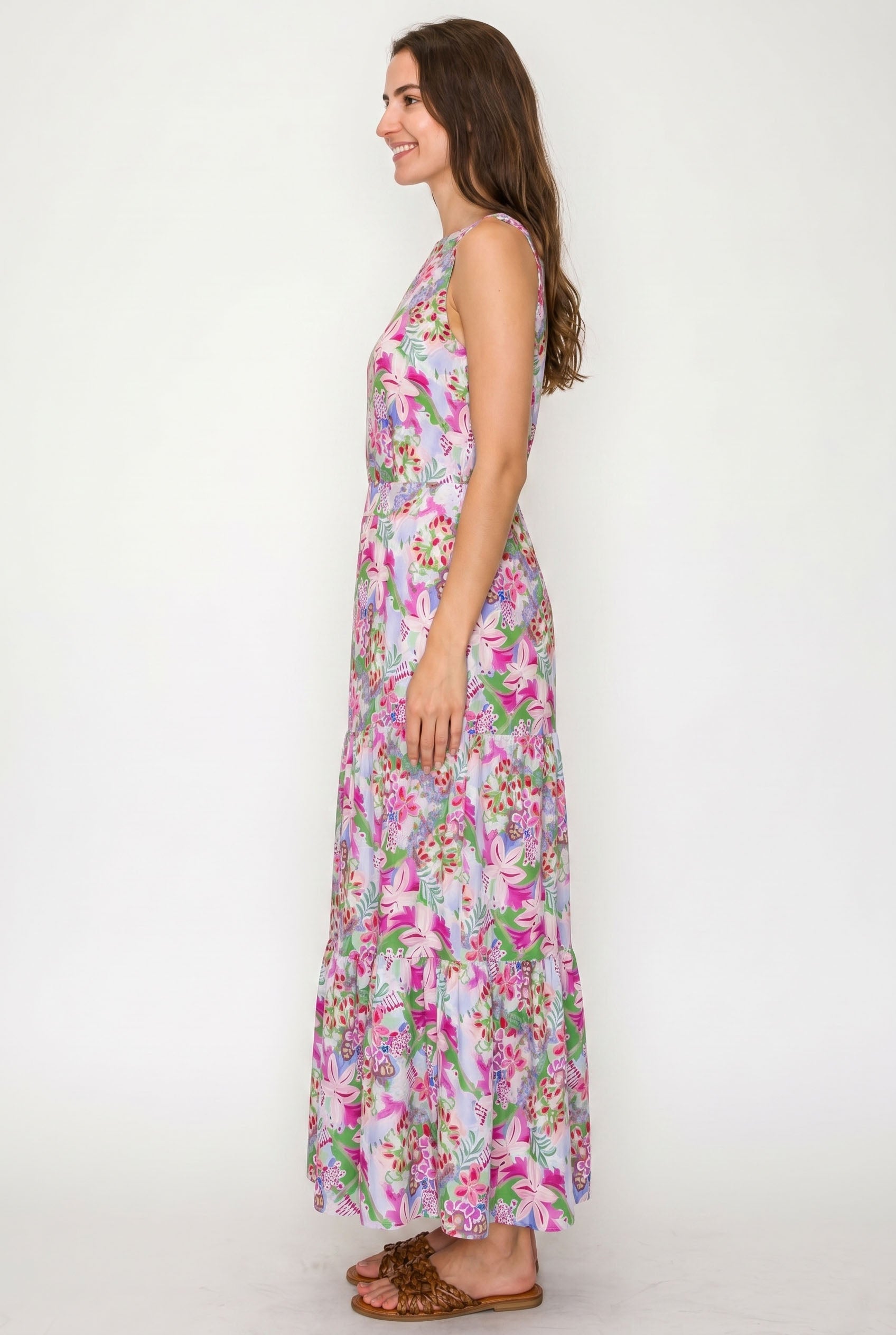 Woman wearing a floral dress on a white background