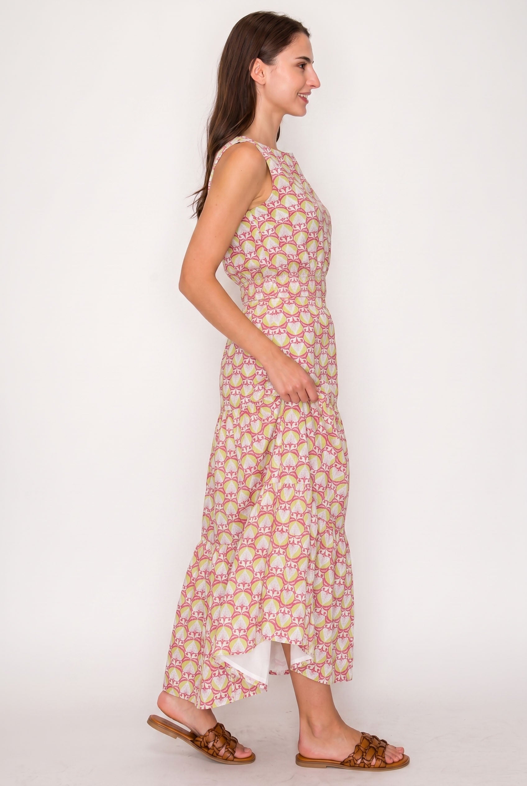 Woman wearing a floral dress on a white background