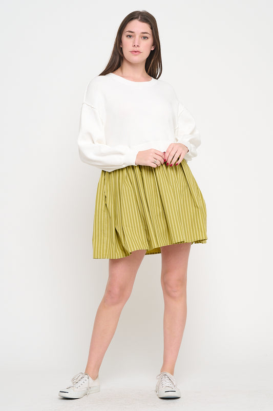 Model wearing Olive Stripe Poplin Two-Fer Dress with knit bodice and A-line striped poplin skirt.

