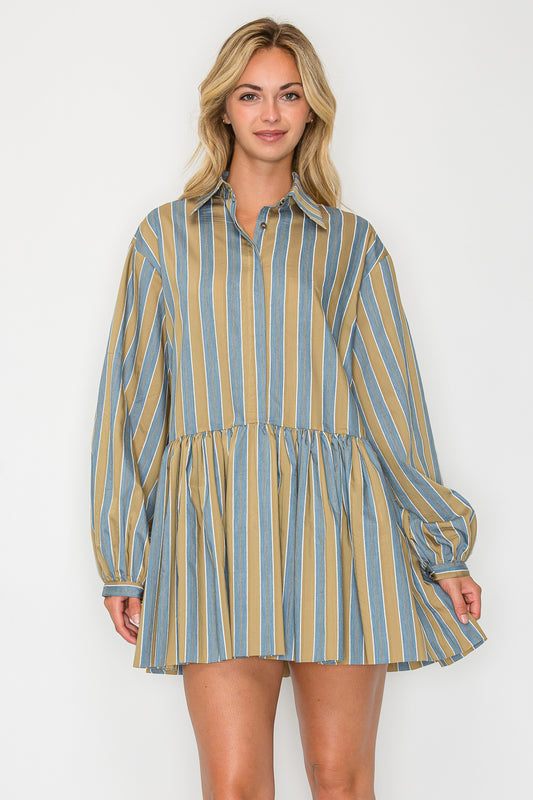 Model wearing the Hazel Fall Stripe Long Sleeve Dress, a blue and tan striped mini dress with a collar, long bishop sleeves, and a drop-waist silhouette.