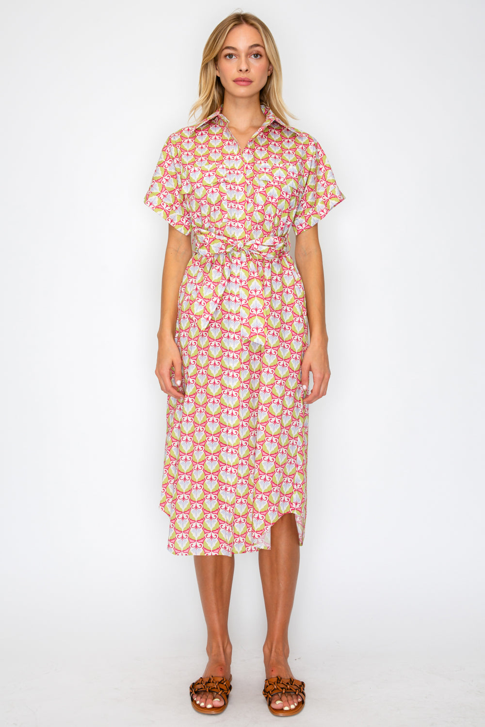 Woman wearing a floral dress on a white background