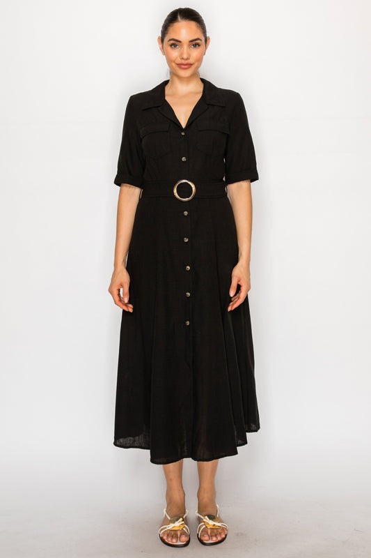 Model wearing the Black Linen Shirt Dress from Meet Me in Santorini, featuring a button front, collared neck, and a wide belt with a circle buckle.