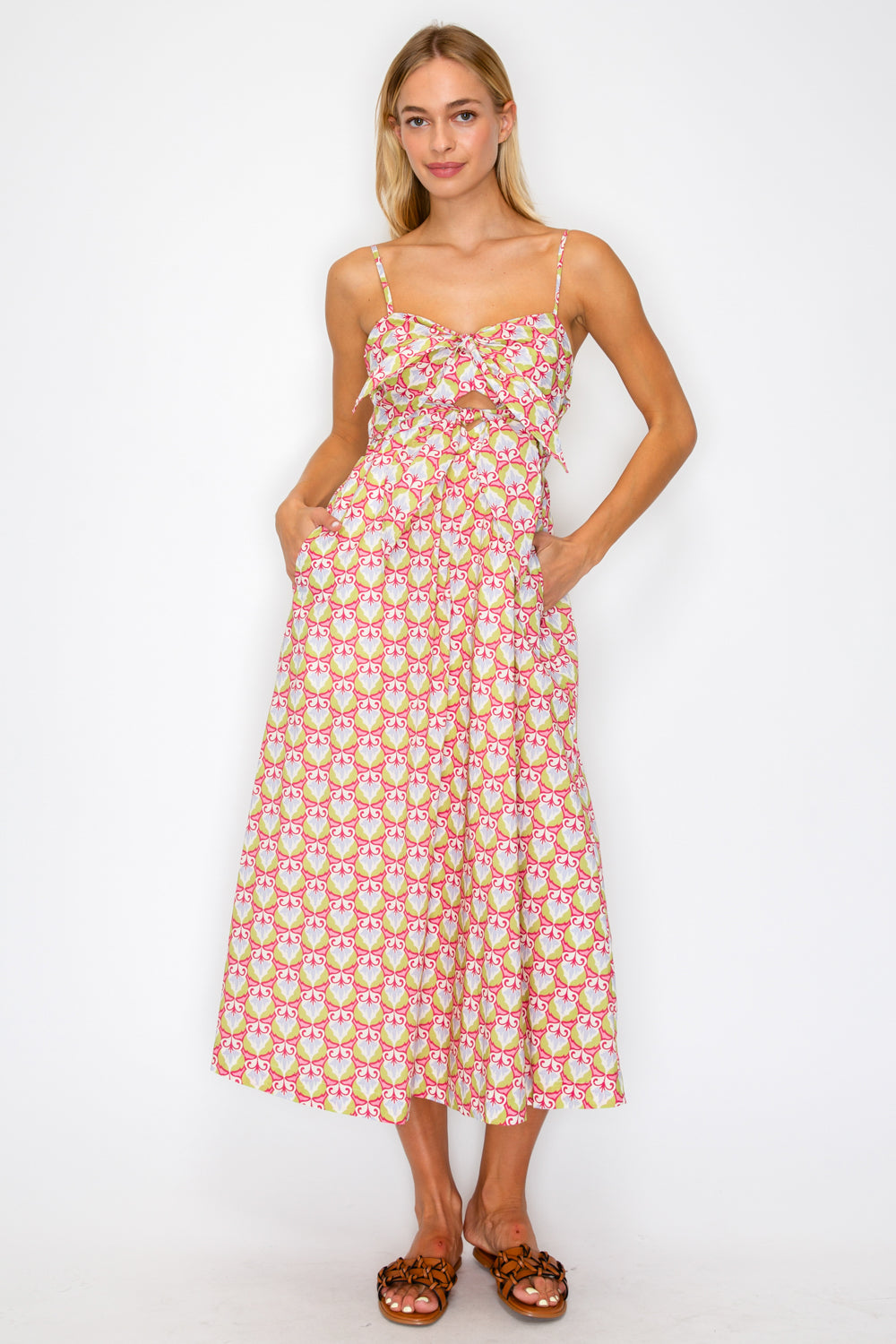 Woman wearing a floral dress on a white background