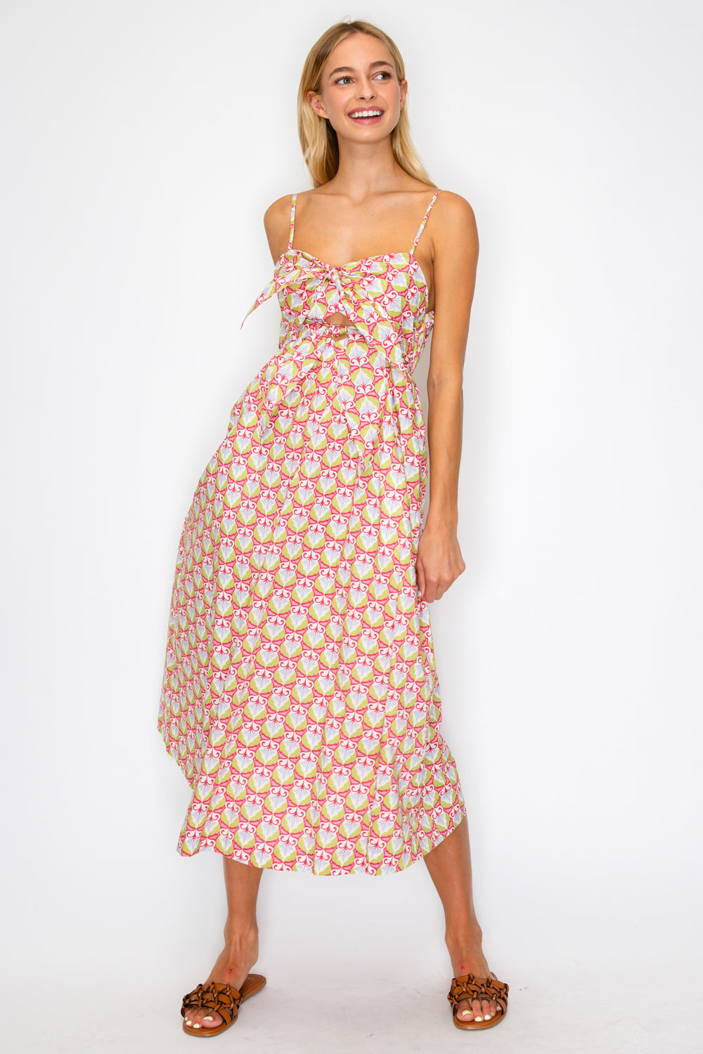 Woman wearing a floral dress on a white background