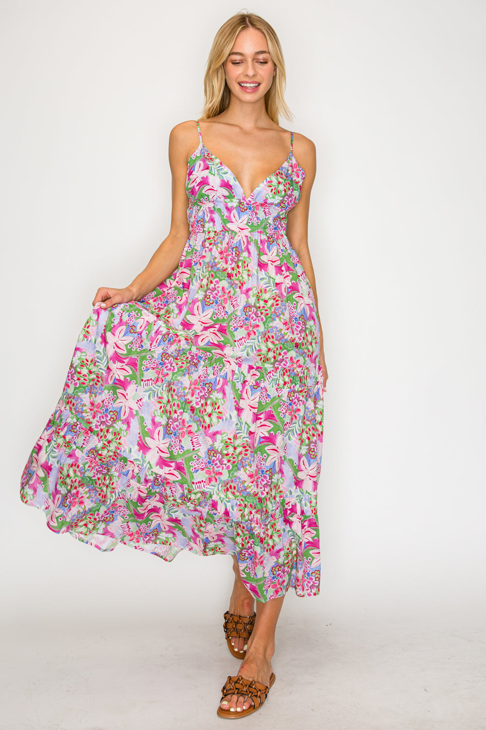 Woman wearing a floral dress on a white background