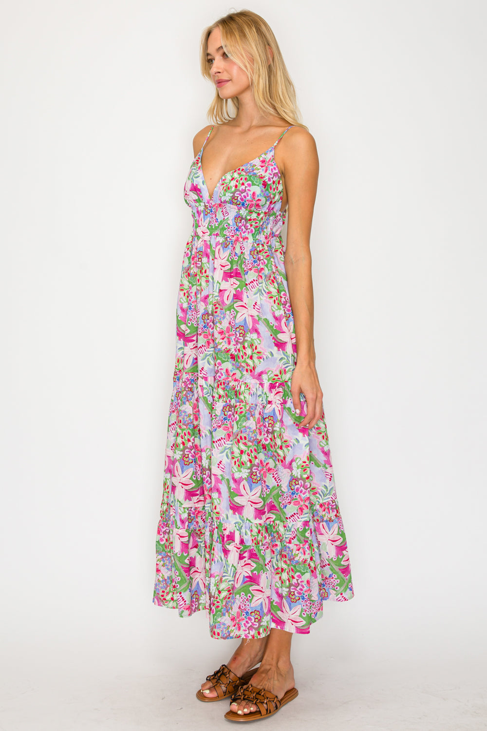 Woman wearing a floral dress on a white background